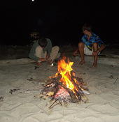 Fire boys and moon on water