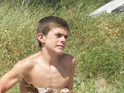 Ethan hefts logs