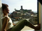 Karen in the window of our room Vernazza Cinque Terre