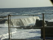 Vernazza washing over the docks