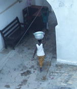 A heavy load of water leaves the castle gracefully