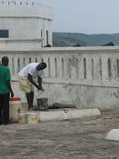 villagers haul water from the castle well in the evening