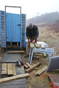 Bruce working in rain and cold